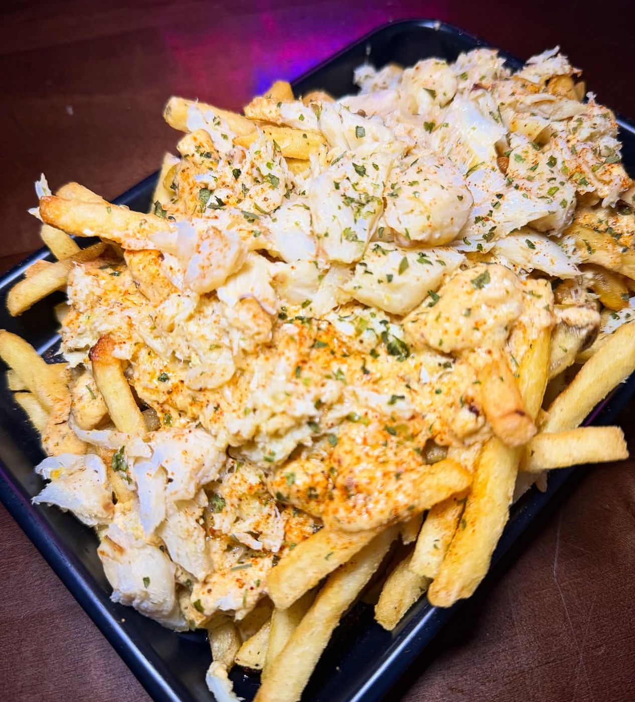 Monz Crabby Fries loaded with lump crab